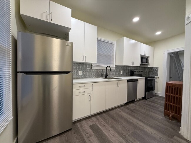 Building Photo - Now showing updated 4BR 1.5 bath house!