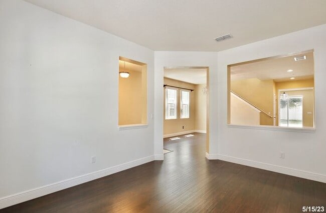Building Photo - Gorgeous 4/3.5 Home with a Large Fenced Ba...