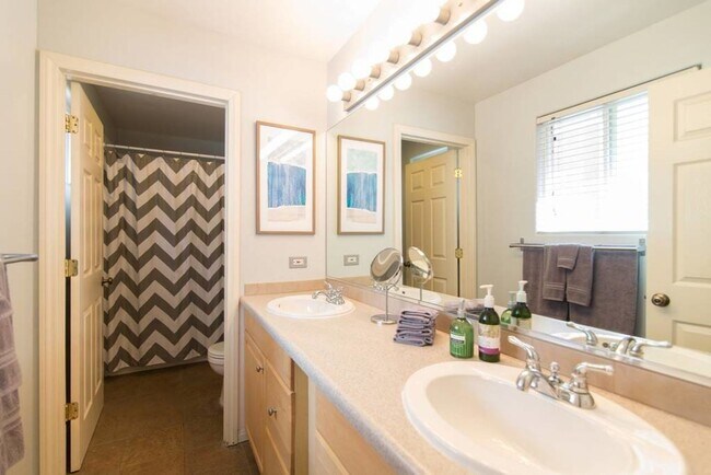 Building Photo - Stunning Duplex with Wrap Around Deck - Available Now