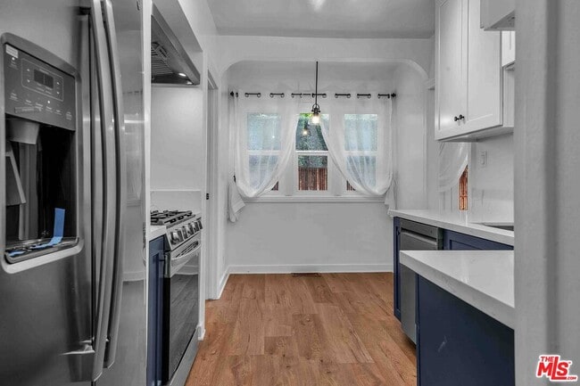 Building Photo - 223 N Almont Dr