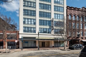 Building Photo - Enjoy the excitement of living in the heart of downtown Knoxville with this FURNISHED loft at $27...
