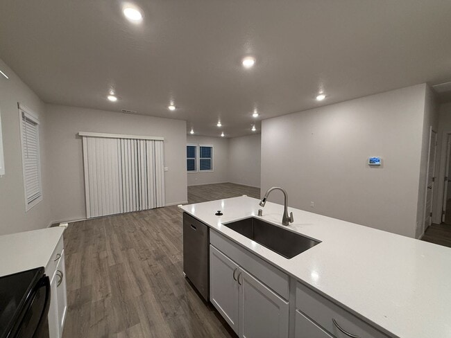 Building Photo - New Construction 4 Bed Mead School District Rancher w/ Fully-Fenced Yard and Attached Garage!