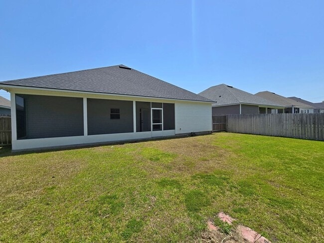 Building Photo - Stylish 4-Bedroom Home with Screened Porch...
