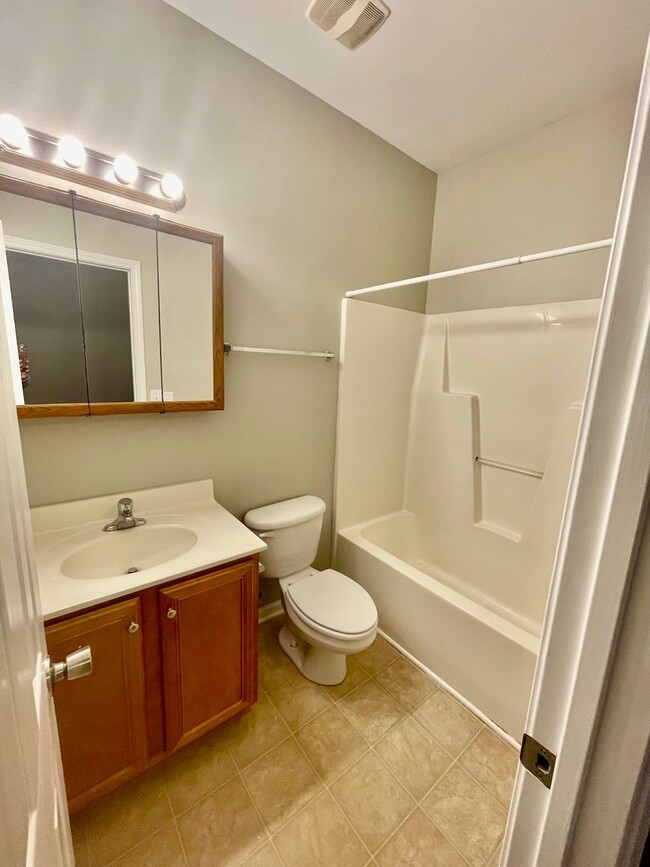 Building Photo - This two-story, 4-bedroom, 2-bath duplex in Fort Mill, SC sits on a corner lot