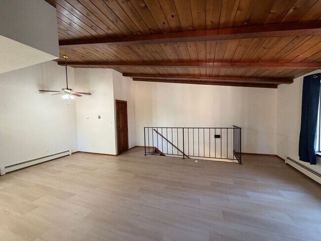 Building Photo - 2 Bed + Huge Bonus Room -  new flooring, paint and kitchen!   Lake Village Condo w/Forest Views