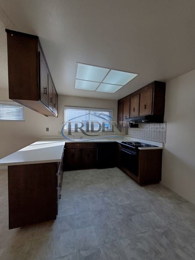 Building Photo - This is a cute 4 bedroom, 2 bath house in an established Woodland community