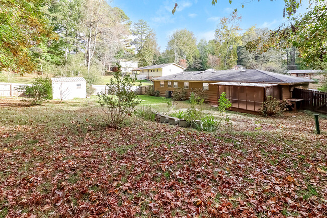 Building Photo - Bright Interiors & Spacious Backyard