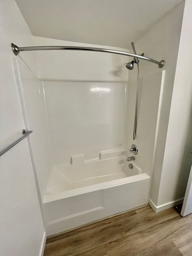 Building Photo - Sleek Townhome with Garage and Private Pat...