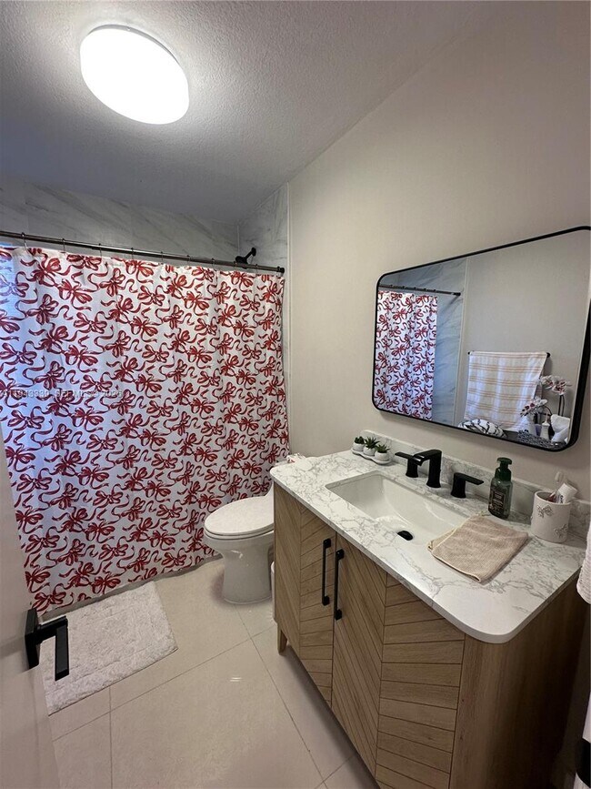 Building Photo - 6729 Petunia Dr