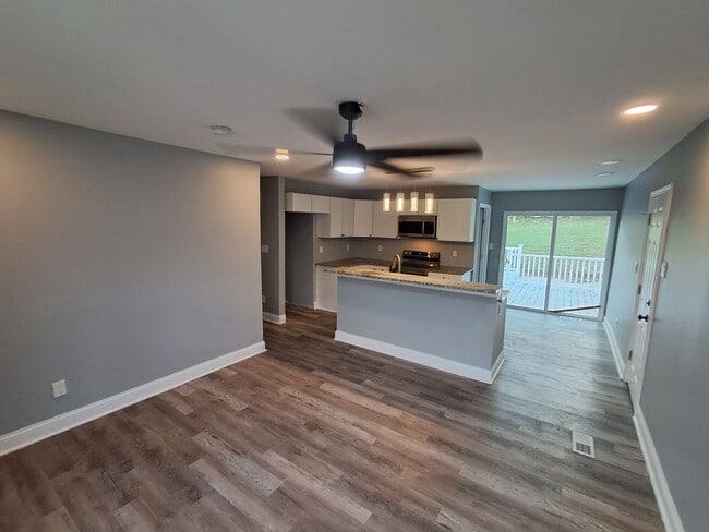 Building Photo - COMING SOON: Fully Renovated, Full of Charm — Space, Style, and a Porch Swing Vibe