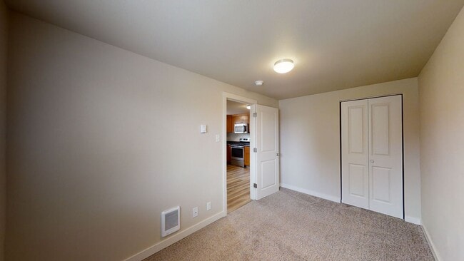 Building Photo - Charming 2 Bedroom Duplex - Granite Counters, Plank Flooring, Fully Fenced, Storage Shed!