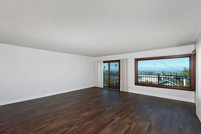 Building Photo - Timeless 4BR/2BA Corner-Lot Home, Perched on the Hills of Ocean Beach. Sweeping Ocean Views