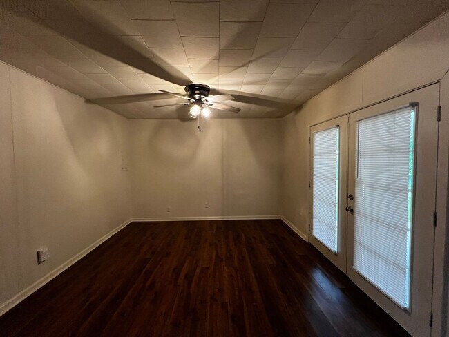 Building Photo - 3 Bedroom, 1.5 Bathroom, Brick Home with yard and Storage Building, Covered Porch