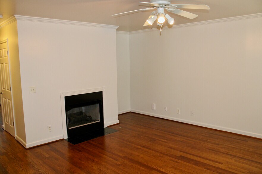 Living room with gas fireplace - 161 37th Ave N