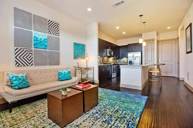 Building Photo - Making Midtown Buzz — Live in Style Today!