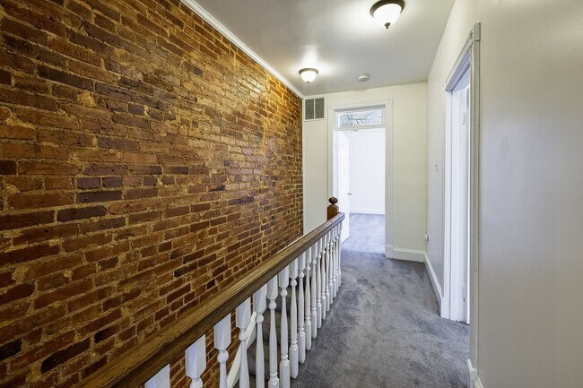 Building Photo - Historic & Charming 3BR Rowhouse near Howard is Move-in Ready!