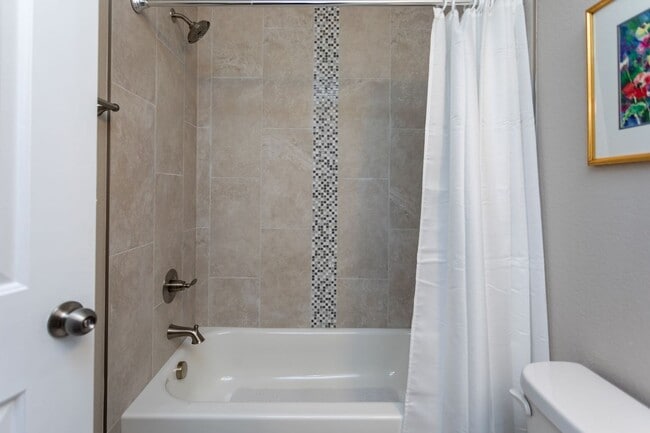 Building Photo - Stylish 3-Bedroom Townhome with Fireplace, Modern Kitchen & Spacious Layout!