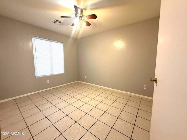 Building Photo - 8520 W Palm Ln