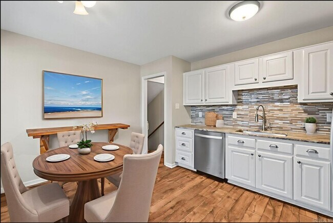 Building Photo - Welcome Home: Charming Brick Beauty with Covered Porch.