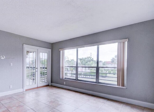 Building Photo - 7435 Woodmont Ter