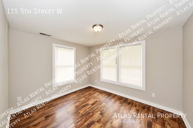 Building Photo - 115 5th St W