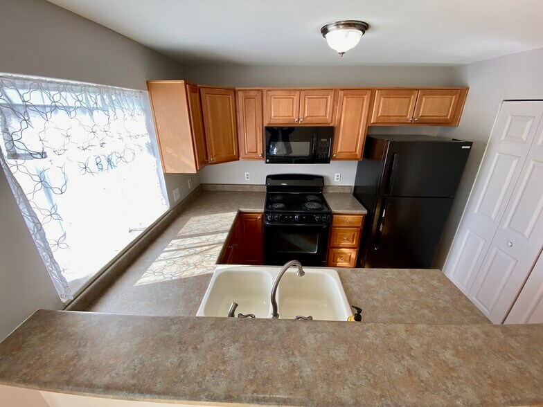 Building Photo - 9703 W Chatfield Ave