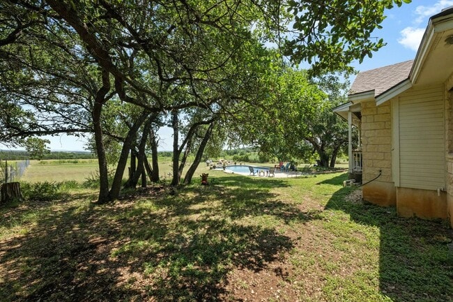 Building Photo - Serene Oasis on Nearly 2 Acres With a Pool!!