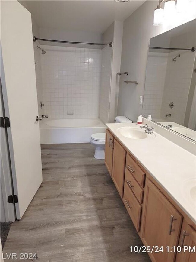 Building Photo - SECOND-FLOOR UNIT IN A GATED SOUTHWEST COM...