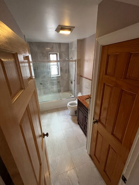 Beautiful granite/marble bathroom. - 202 Orient Ave