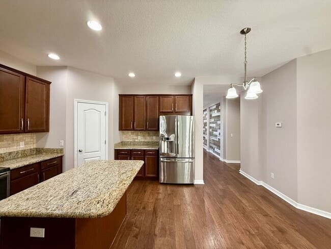 Building Photo - SPACIOUS Two Story Beautiful 5/4 Home in The Enclave At Aloma!