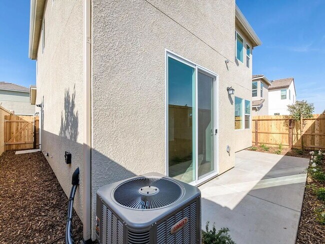 Building Photo - NEW! Modern, Wilson Home. 3 bedrooms / 2.5-bathroom single-family home in a quiet gated community...