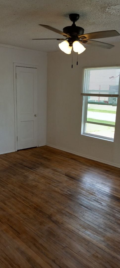 Building Photo - NEW listing-refinished hardwood floors, new laminate and paint throughout