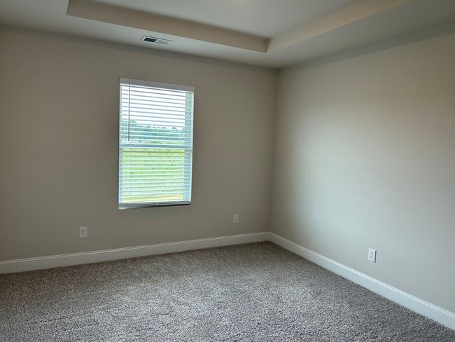 Building Photo - Three car garage Two story home close to e...
