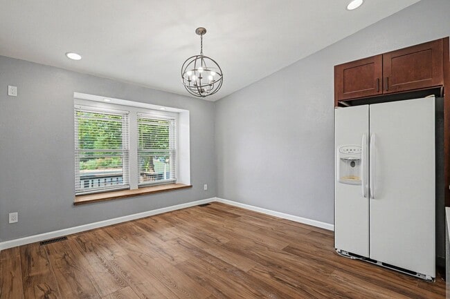 Building Photo - Updated 4BR Corner Lot Home with Finished Basement & 2-Car Garage