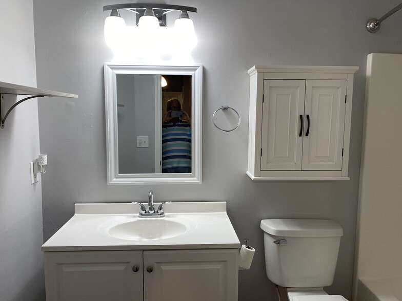Upstairs bath has marble sinks and plenty of storage - 1305 Cedar Shoals Drive #500