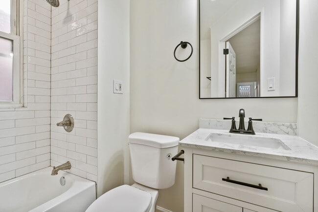 Building Photo - 4 bed 1.5 bath - completely updated, central air, patio.  Great location