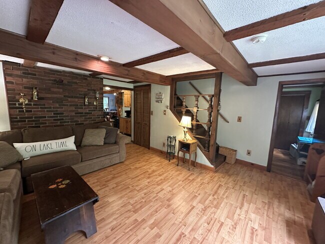 Building Photo - Charming 3BR Waterfront Retreat with Sunroom, Brick Accent & Scenic Lake Views
