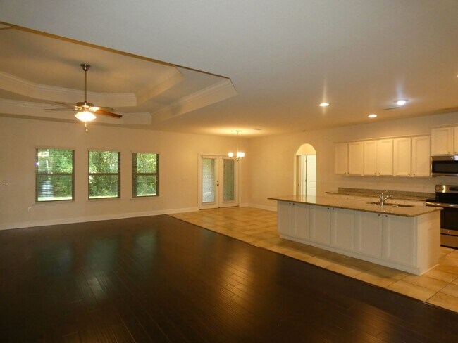 Building Photo - Spacious 5-Bedroom Home - Heart of Pace