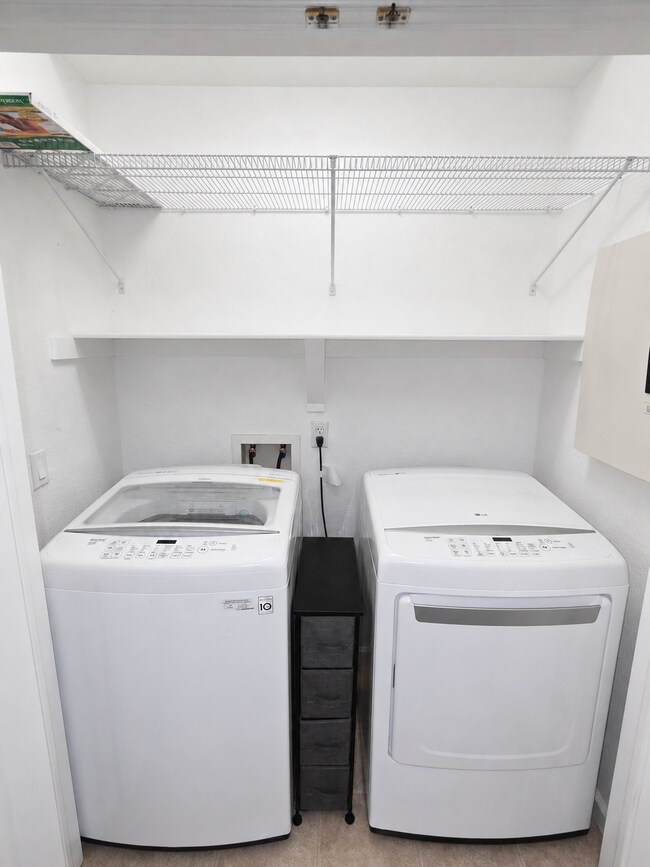 Building Photo - Spacious 2-Bedroom Condo with Garage, Fireplace, Pool & Most Included Utilities