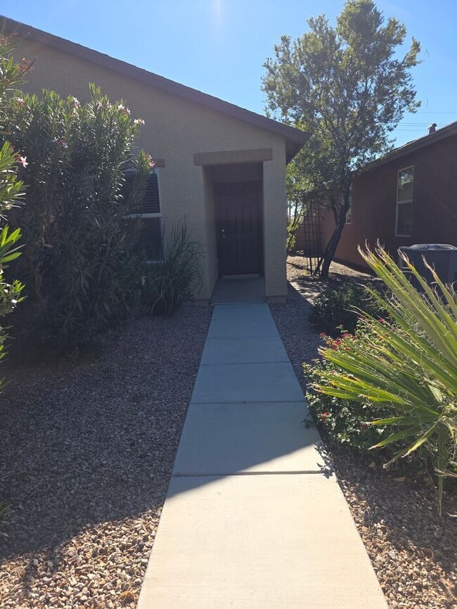 Building Photo - COMING SOON! New 3BR 2 BA Home w/ 2-Car Garage • Stainless Kitchen • Timer-Irrigated Yard in East...