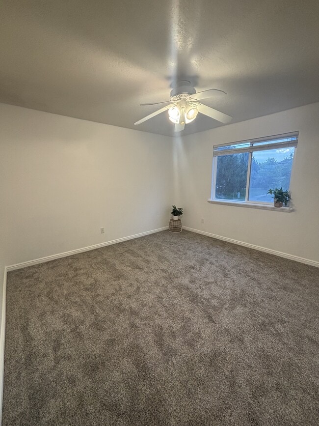 Building Photo - 8083 N Ridge Loop E