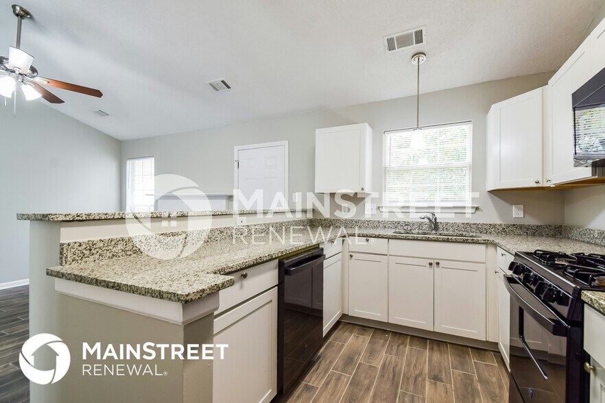 Building Photo - 9407 Rollinghills Dr