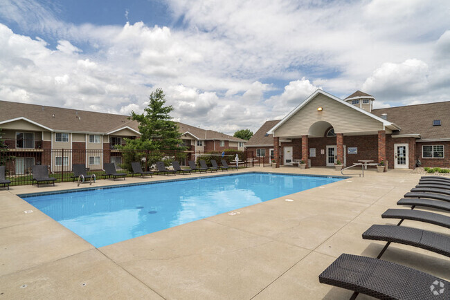 Our community features a sparkling pool and plenty of lounge seating, offering the perfect place to relax and enjoy sunny days.