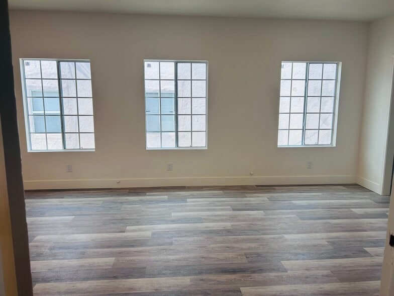 Open Living Room with abundant natural light. - 4043 1/2 W 21st St