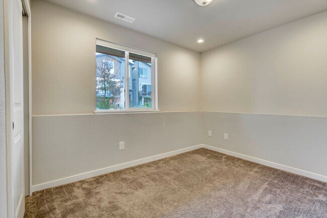 Building Photo - Modern 4BR with Open Kitchen, Patio & 2-Car Garage