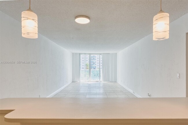Building Photo - 19380 Collins Ave