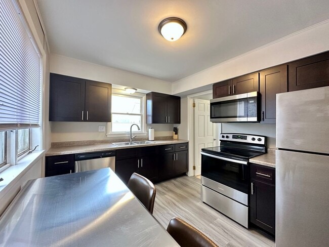 Building Photo - Available June 1st - Beautifully Renovated 4 Bed 1 Bath w/ Garage