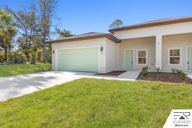Building Photo - Modern 3-Bed, 2-Bath Townhome with Private Yard & 2-Car Garage