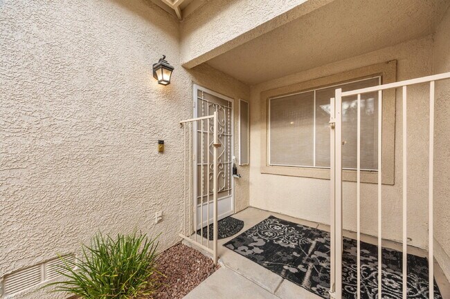 Building Photo - Charming and spacious single-story townhome nestled within a gated community in the desirable Nor...