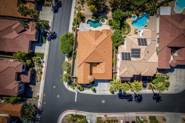 Located on the corner of a cul-du-sac in guard gated Renaissance of Seven Hills. - 2850 Bronzino Ct